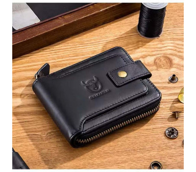 Чоловічий гаманець на кнопці TB231A Bull чорний