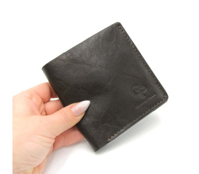 Чоловічий шкіряний портмоне коричневий Grande Pelle 538420 з монетницею